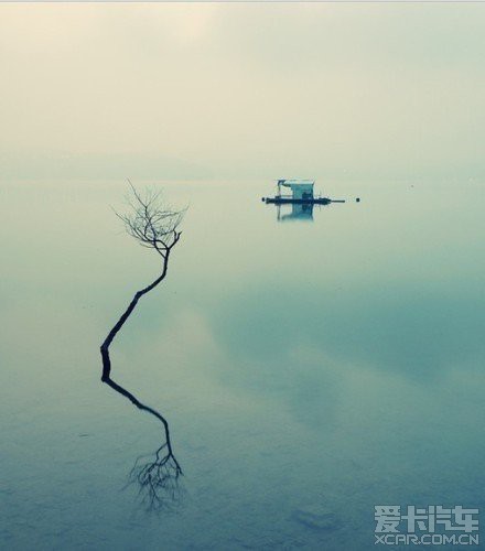 烟雨江南,撑一把油纸伞,你在桥上看风景,看风景