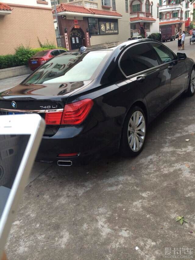12德版宝马740,黑色黑黄内