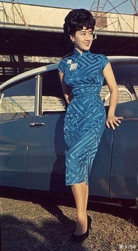 A stylish lady in cheongsam posing next to Citroën , Hong Kong, 1960s